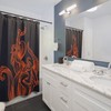 Bring some color to your bathroom with this Orange & Blue Octopus Tentacle Monster Shower Curtain