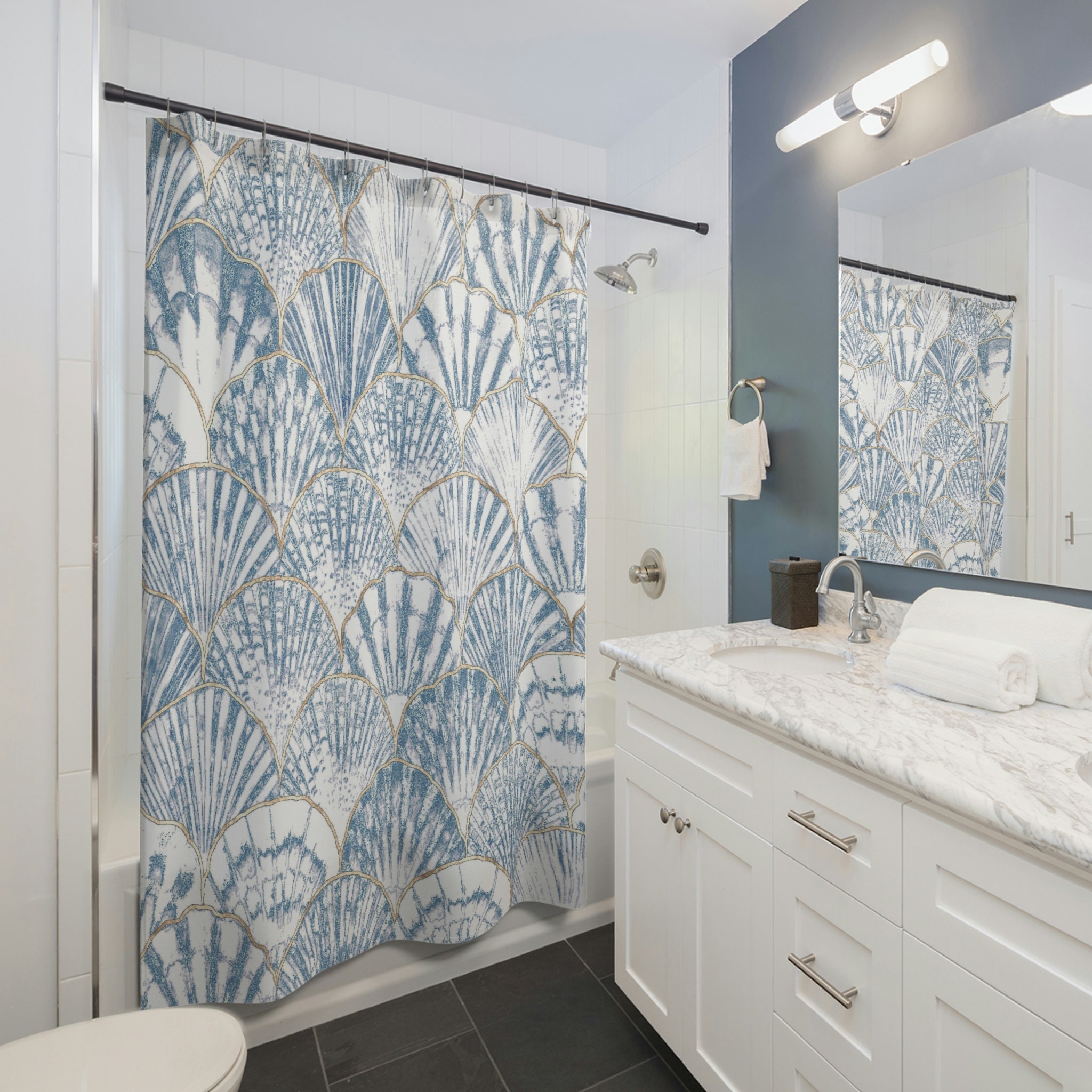 Create a serene beach feel with this Beachy Sea Shell Blue and White Ocean Shower Curtain