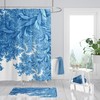 Elegant Blue Shower Curtain with Draping Leaves and White Bath Accessories