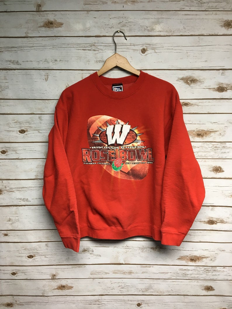 Go Retro with a University of Wisconsin Badgers Vintage 90's Rose Bowl Pro Player Football Crewneck Sweatshirt