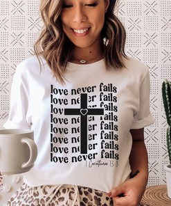 Love Never Fails Christian Religious T-Shirt with Bible Verse and Cross Design