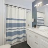 Modern Blue and White Striped Shower Curtain with Geometric Touch