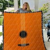 Add Some Retro Charm To Your Bed With This Acoustic Guitar Quilt Blanket