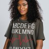 Alphabet HeartBeat Unisex Tees with a cute design and a message of love, featuring alphabet people and random quotes