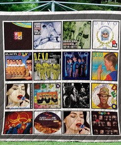 Devo New Arrival Quilt Blanket - Celebrate the music of Devo with this stylish quilt featuring their classic logo.