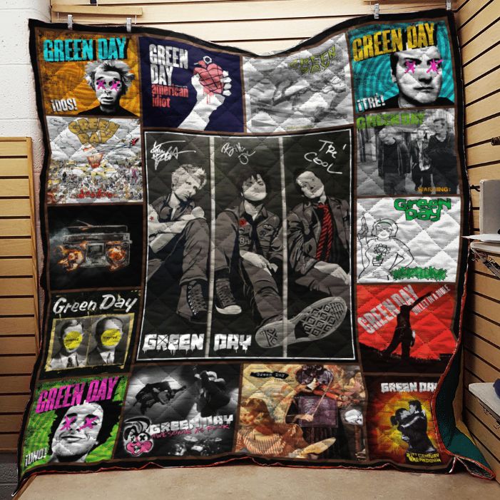 Green Day fans will love this quilt blanket featuring all the members with signs