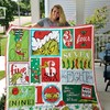 Grinch 12 Days Of Grinchmas Quilt Blanket - Celebrate the holidays with this fun and festive Grinch quilt blanket.