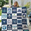 Minnesota Timberwolves fans, add this collected quilt blanket to your collection