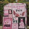 Pig lovers, cuddle up with this Life is Better with Pigs quilt blanket