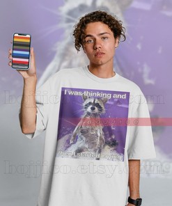 Raccoon Meme: Thinking & Crying T-Shirt for Movie Fans