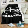 Subaru Blanket V2 - Show off your love for Subaru with this stylish and comfy quilt blanket.