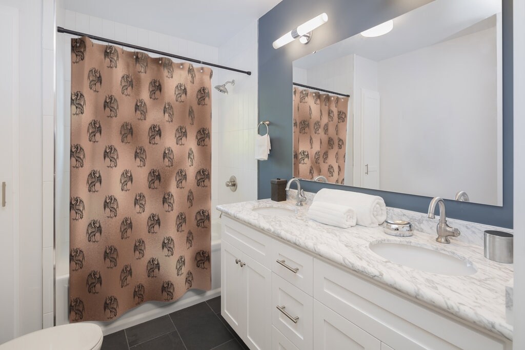Add a Gothic Touch to Your Bathroom with the Rose Gold Dragon Shower Curtain