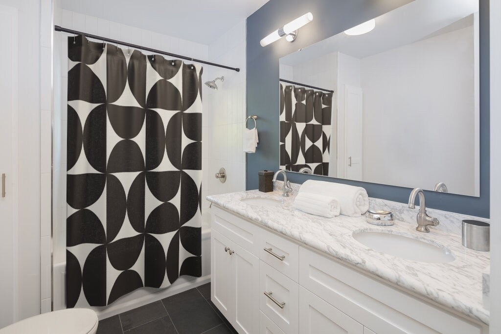 White and Black Geometric Print Shower Curtain for Modern Bathrooms