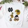 Notre Dame Shirt featuring Snoopy and Woodstock, perfect for Fighting Irish fans